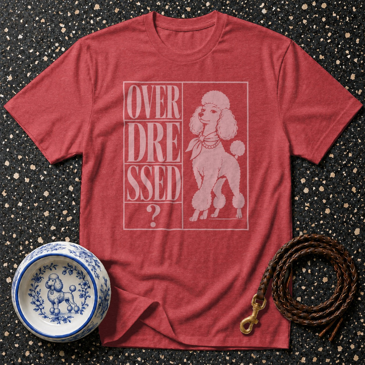 Red t-shirt with "OVER DRESSED ?" and a poodle graphic.