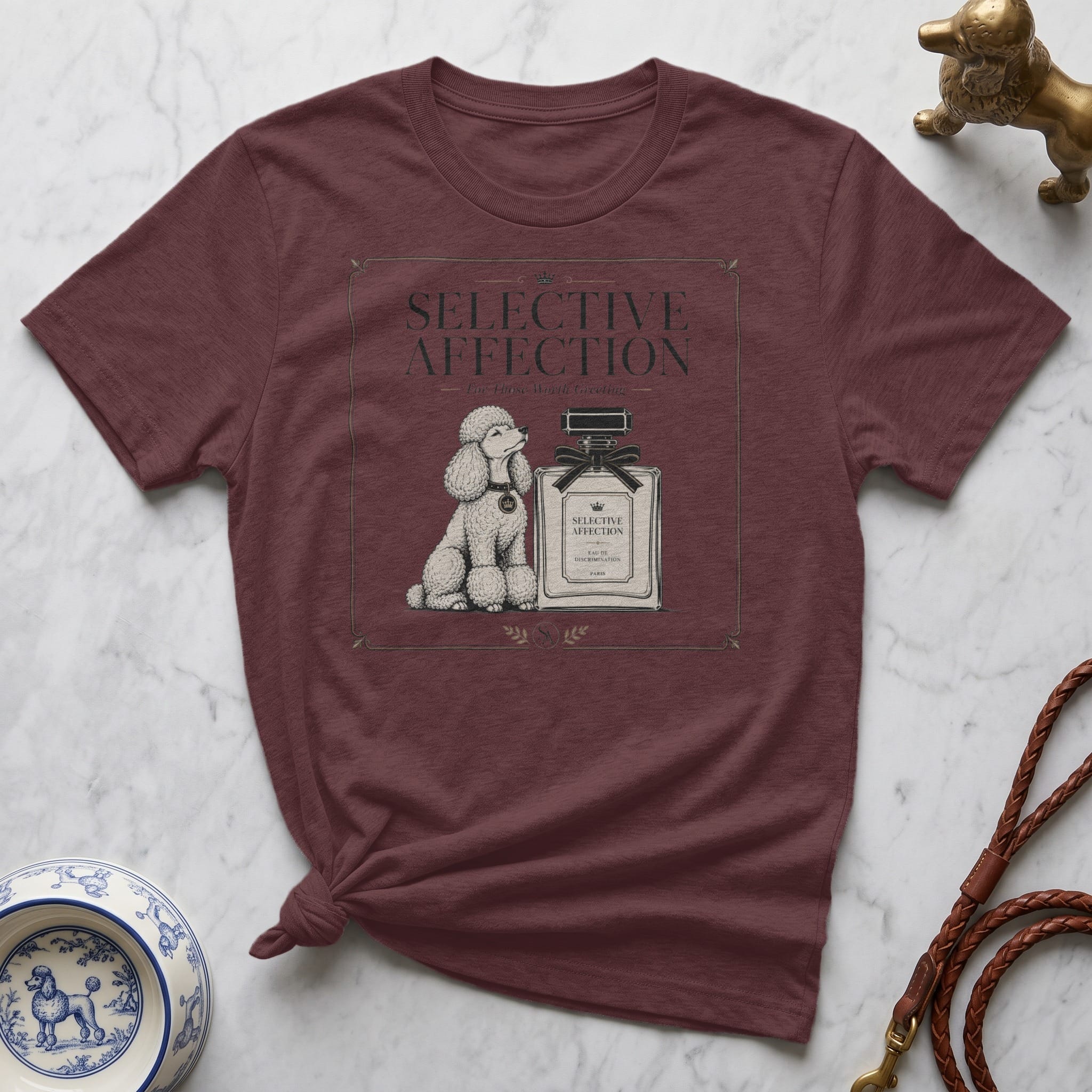 Maroon t-shirt with "Selective Affection" poodle and perfume bottle graphic.