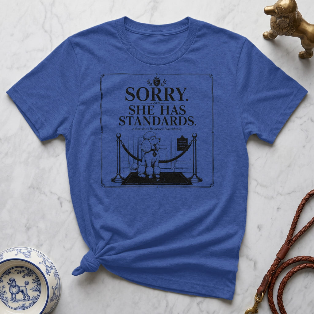 T-shirt graphic of a poodle behind a velvet rope with "Sorry. She has standards." text.