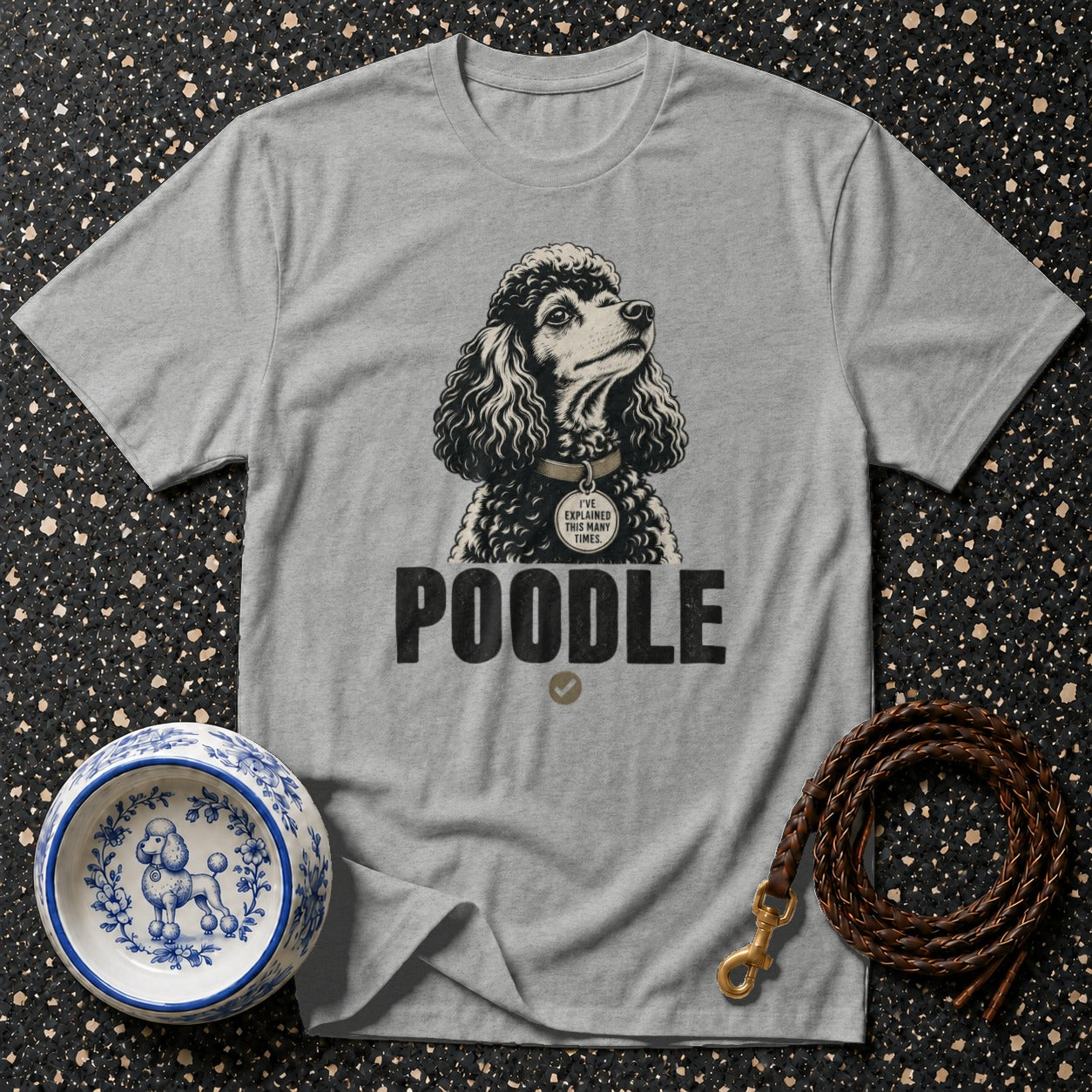 Grey t-shirt with a poodle graphic and the text "POODLE" and "I'VE EXPLAINED THIS MANY TIMES.".