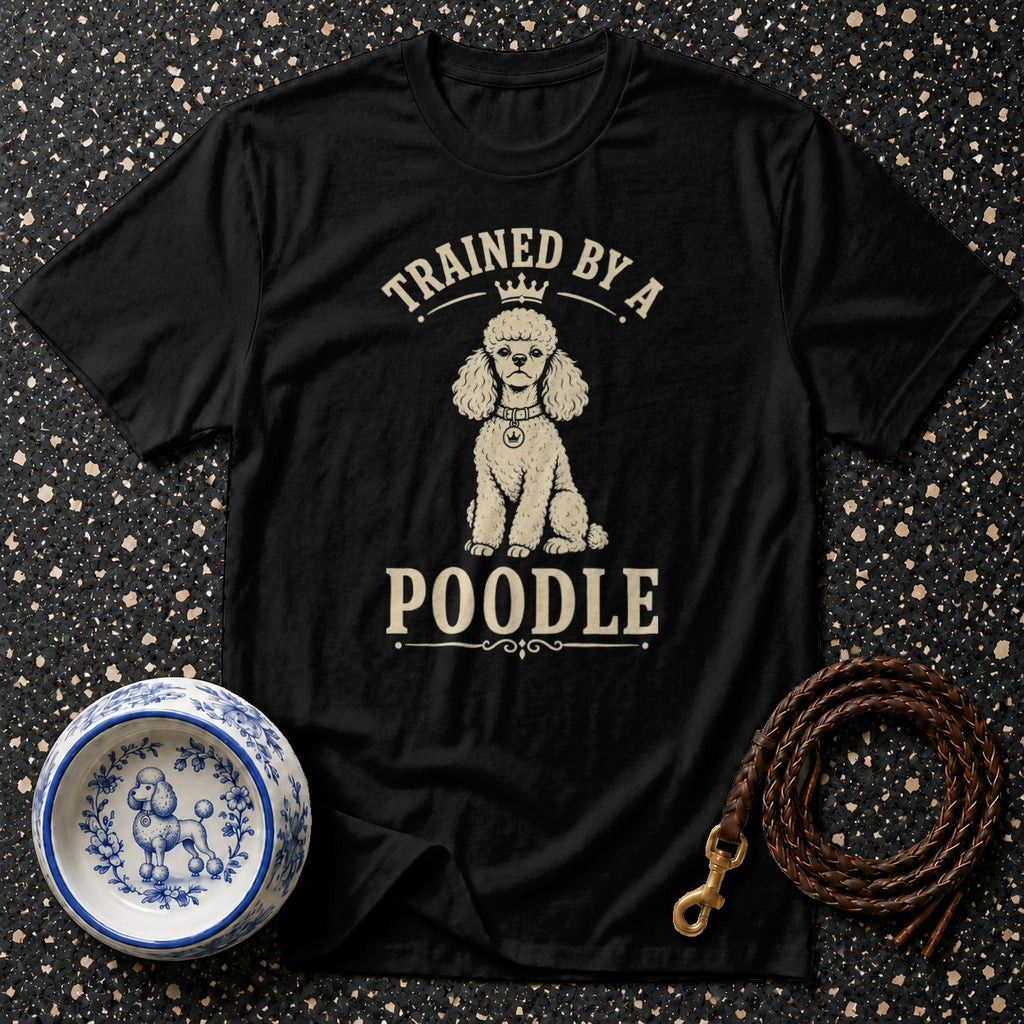 Black t-shirt with "Trained by a POODLE" text and poodle graphic.