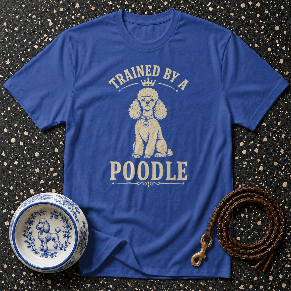 Blue t-shirt with "Trained by a Poodle" text and poodle graphic.