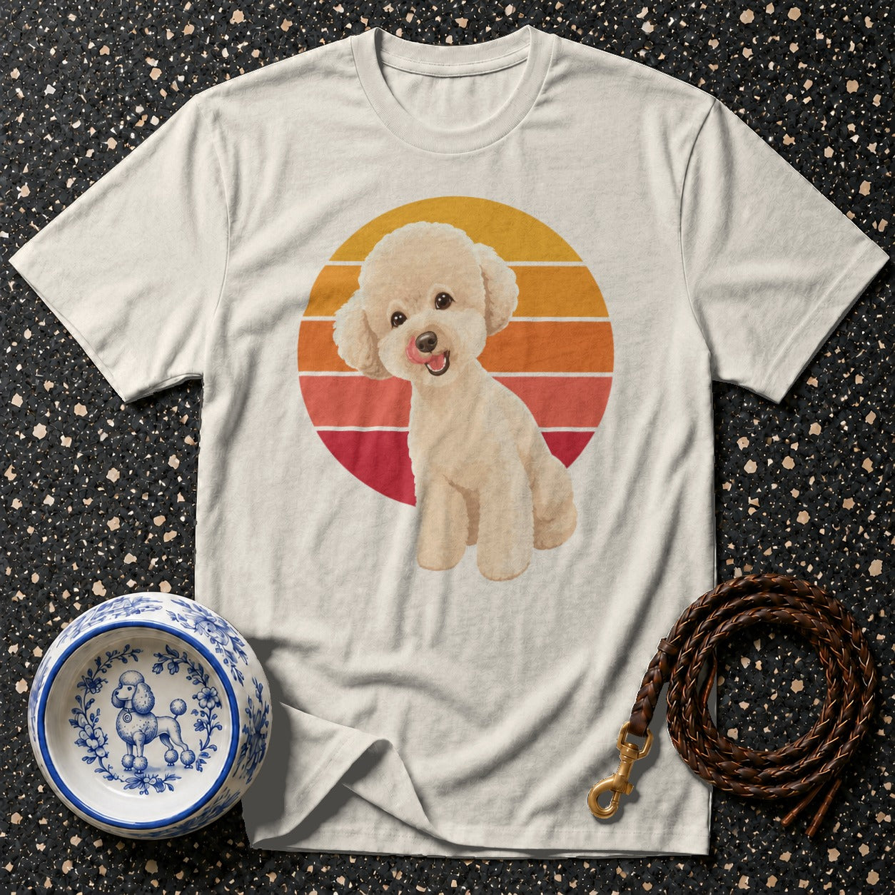 White t-shirt with cream poodle graphic and retro sunset circle.