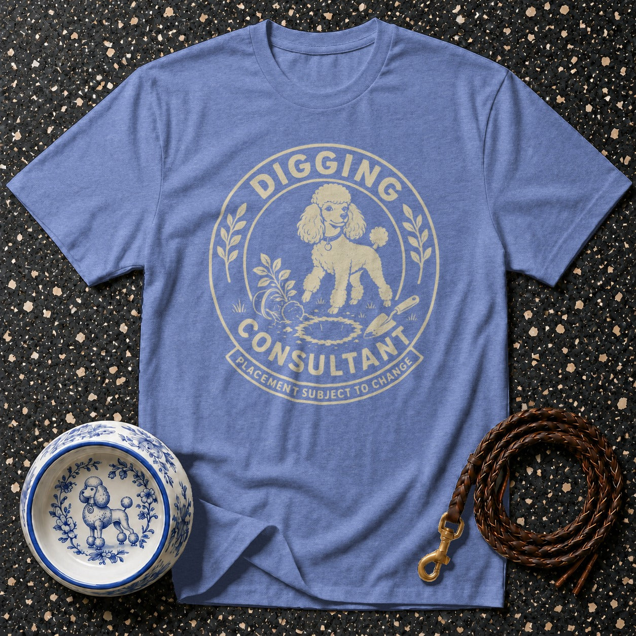 Blue t-shirt with "Digging Consultant" graphic of a poodle digging.