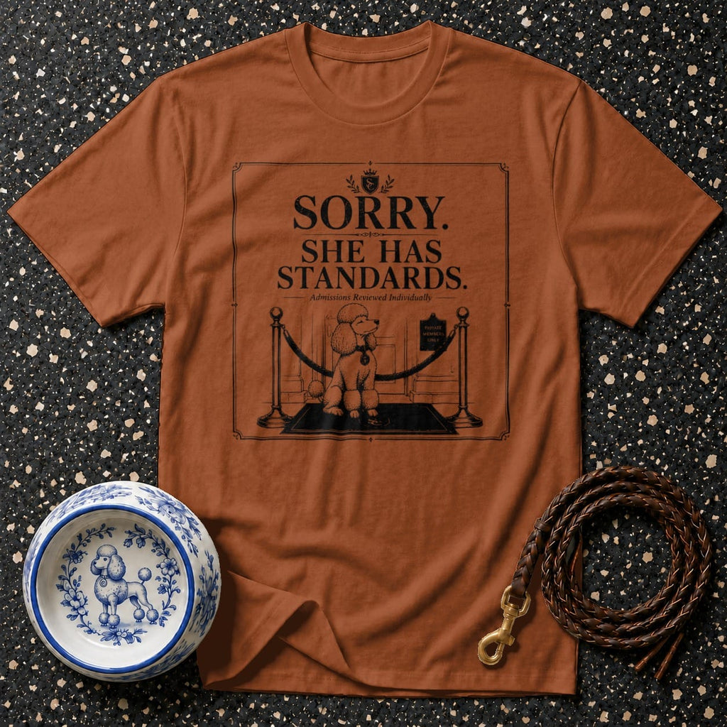 Brown t-shirt with text "SORRY. SHE HAS STANDARDS." and a poodle graphic.