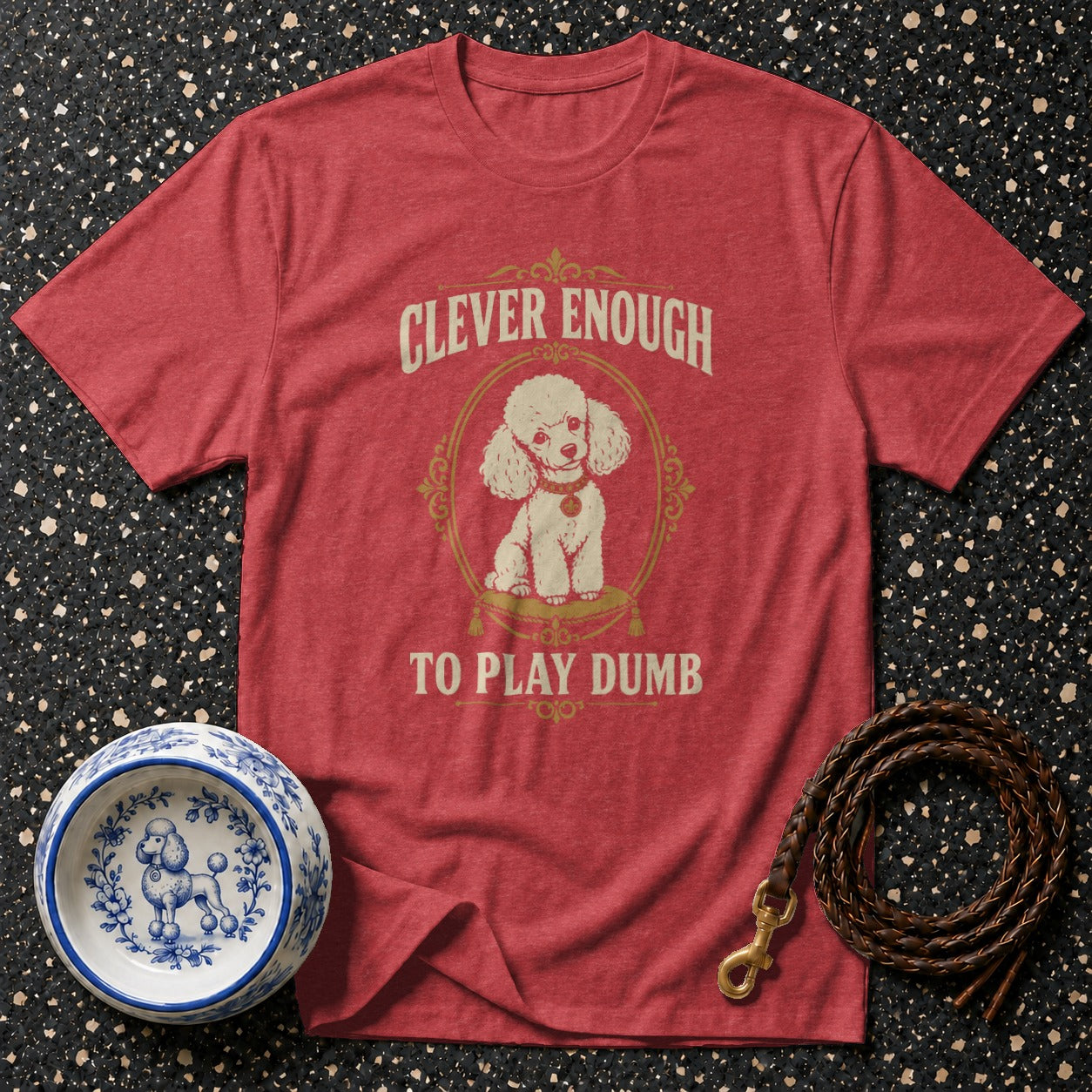 Red t-shirt with white poodle graphic and text "Clever Enough To Play Dumb".