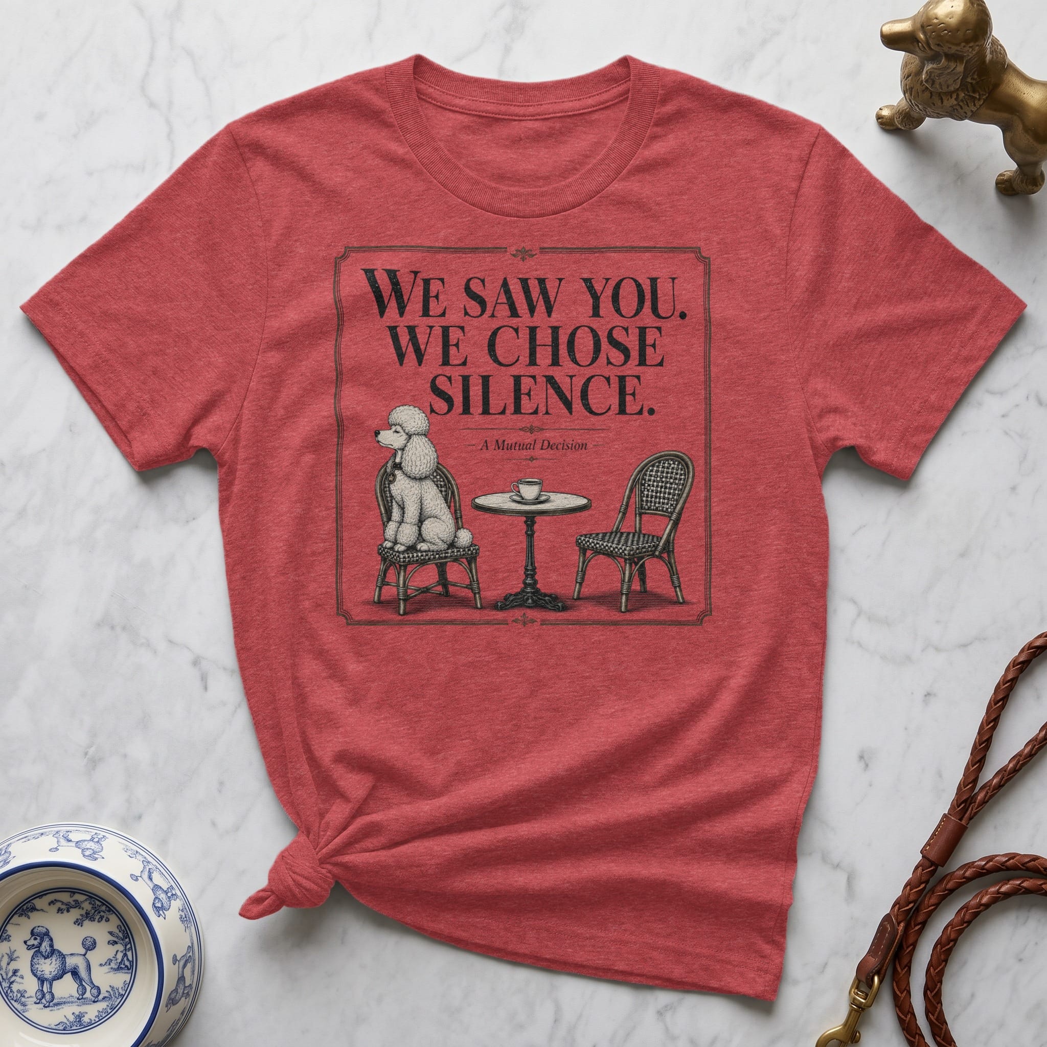 Red t-shirt with graphic "We Saw You. We Chose. Silence. A Mutual Decision."