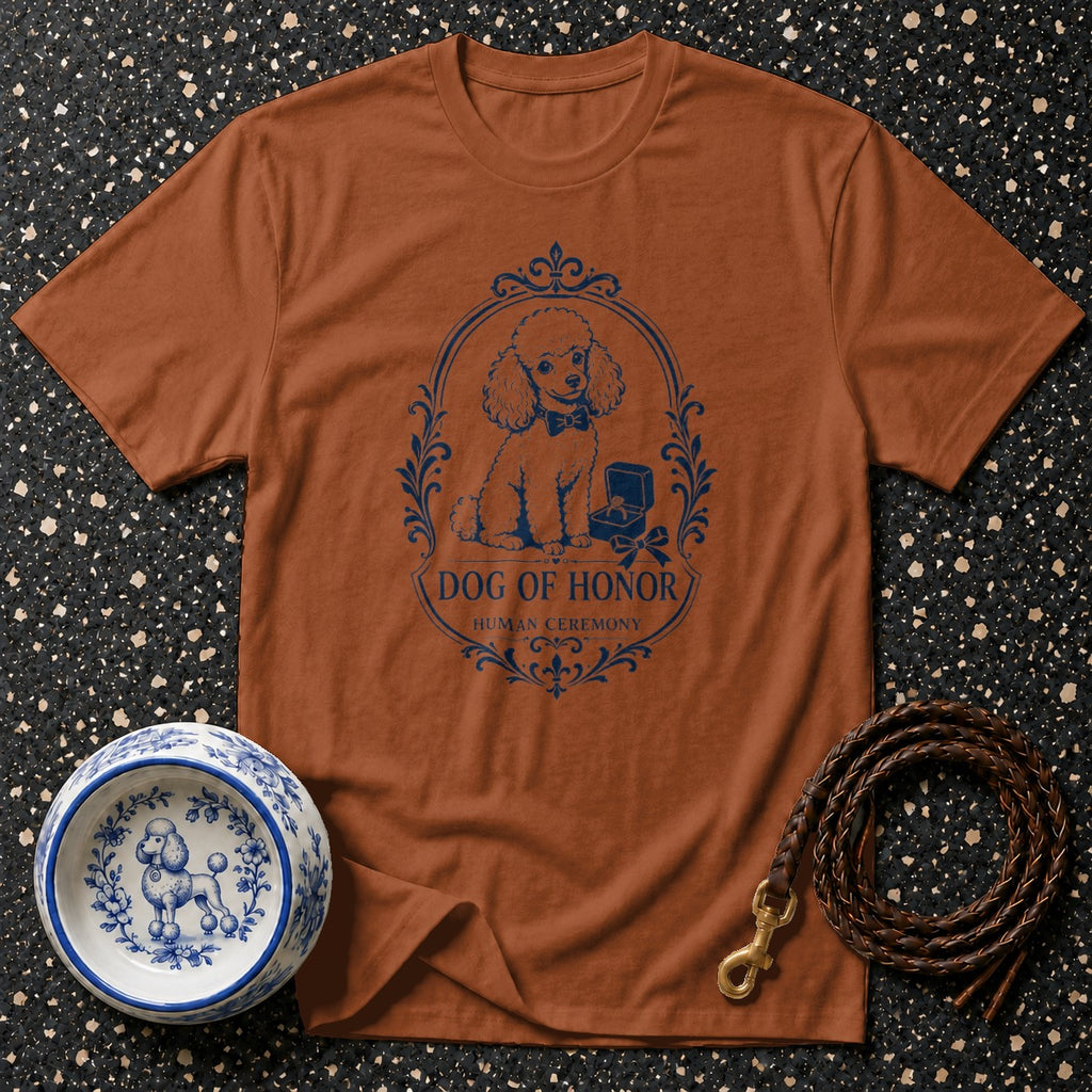 Rust t-shirt with blue "Dog of Honor Human Ceremony" poodle graphic.
