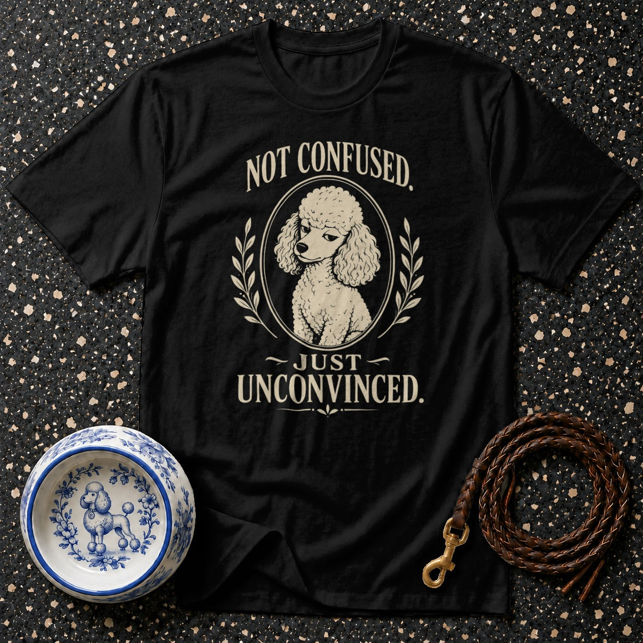 Black t-shirt with poodle graphic and text "NOT CONFUSED. ~JUST UNCONVINCED."