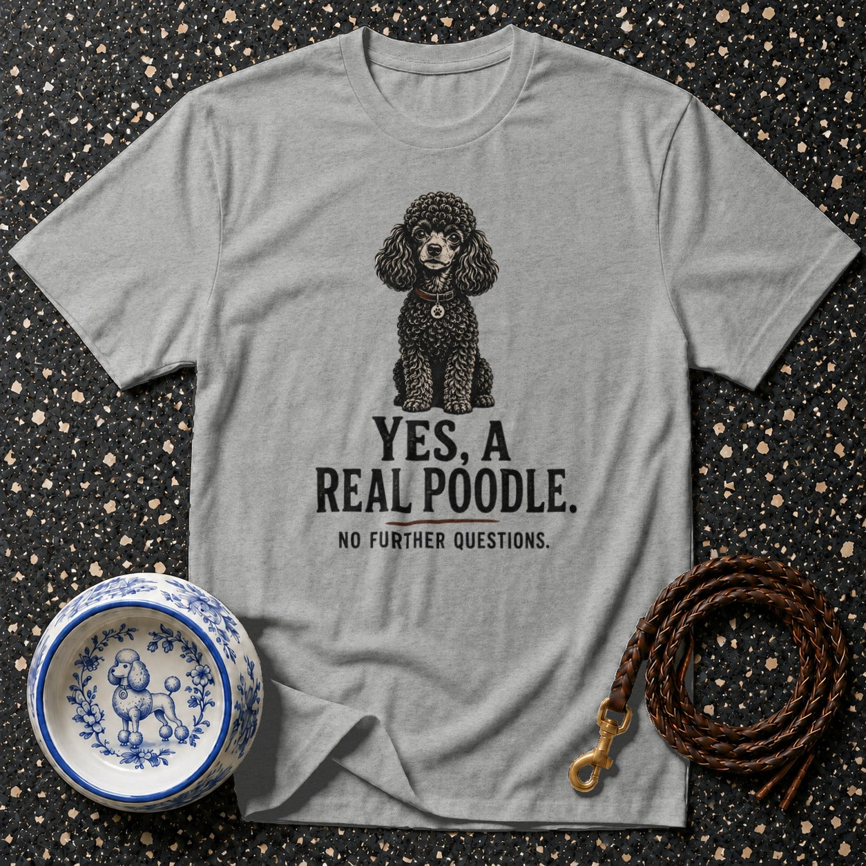 Grey t-shirt with poodle illustration and text: YES, A REAL POODLE.