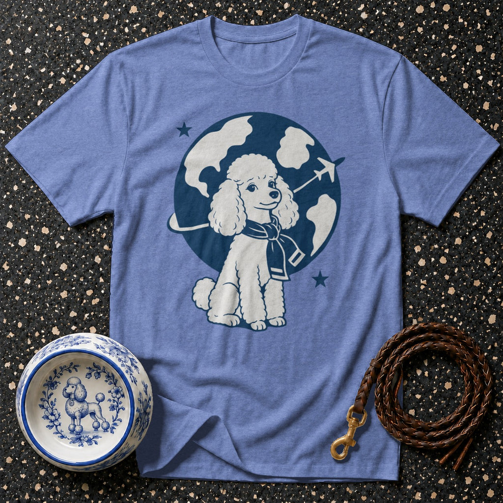 T-shirt with a white poodle wearing a scarf on a globe with an airplane.