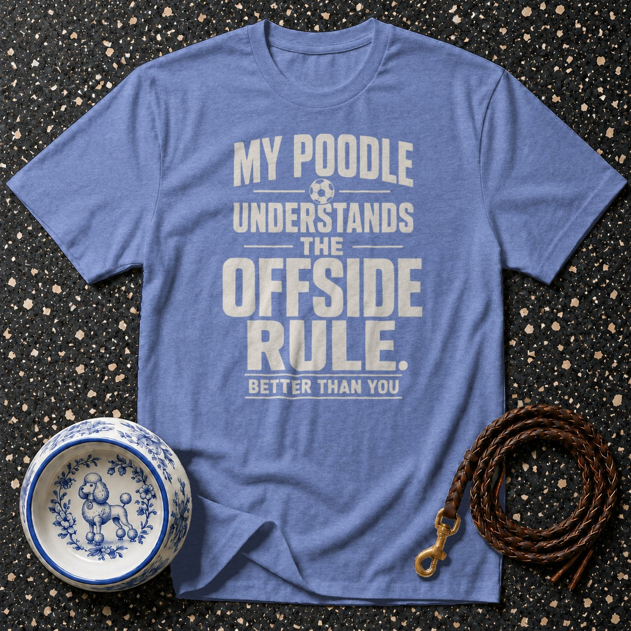 Blue t-shirt with text "My poodle understands the offside rule better than you".