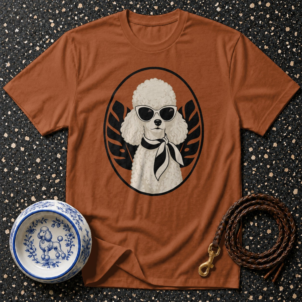 Brown t-shirt with a white poodle wearing sunglasses and a scarf graphic.