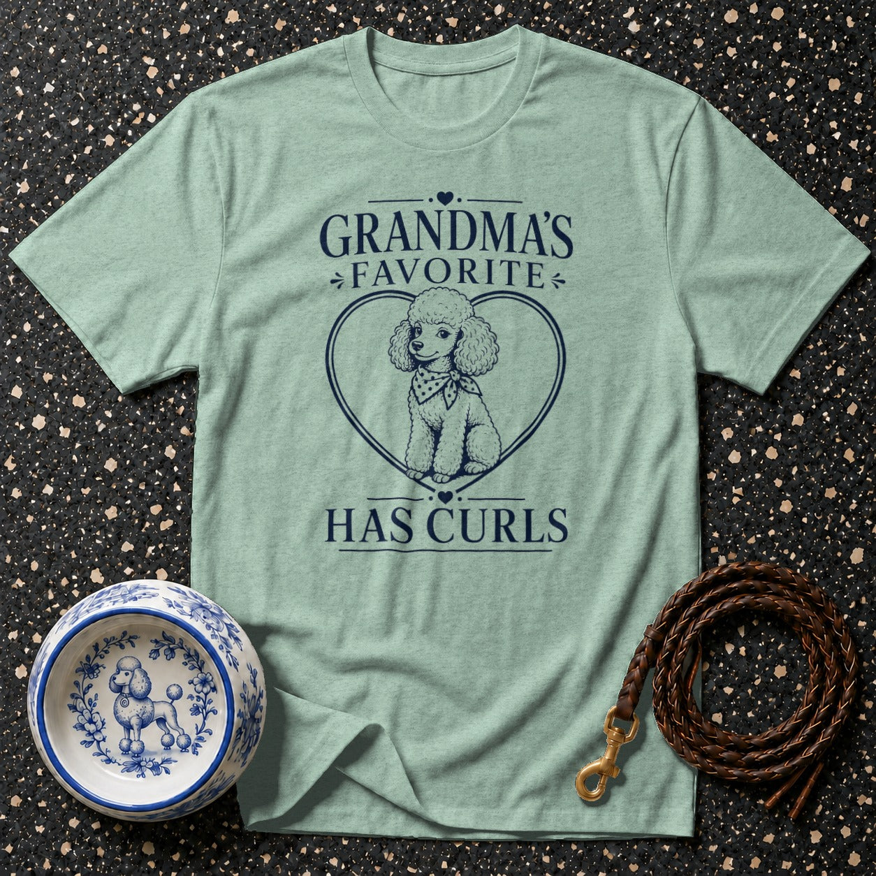Light green t-shirt with "Grandma's Favorite Has Curls" and a poodle in a heart.