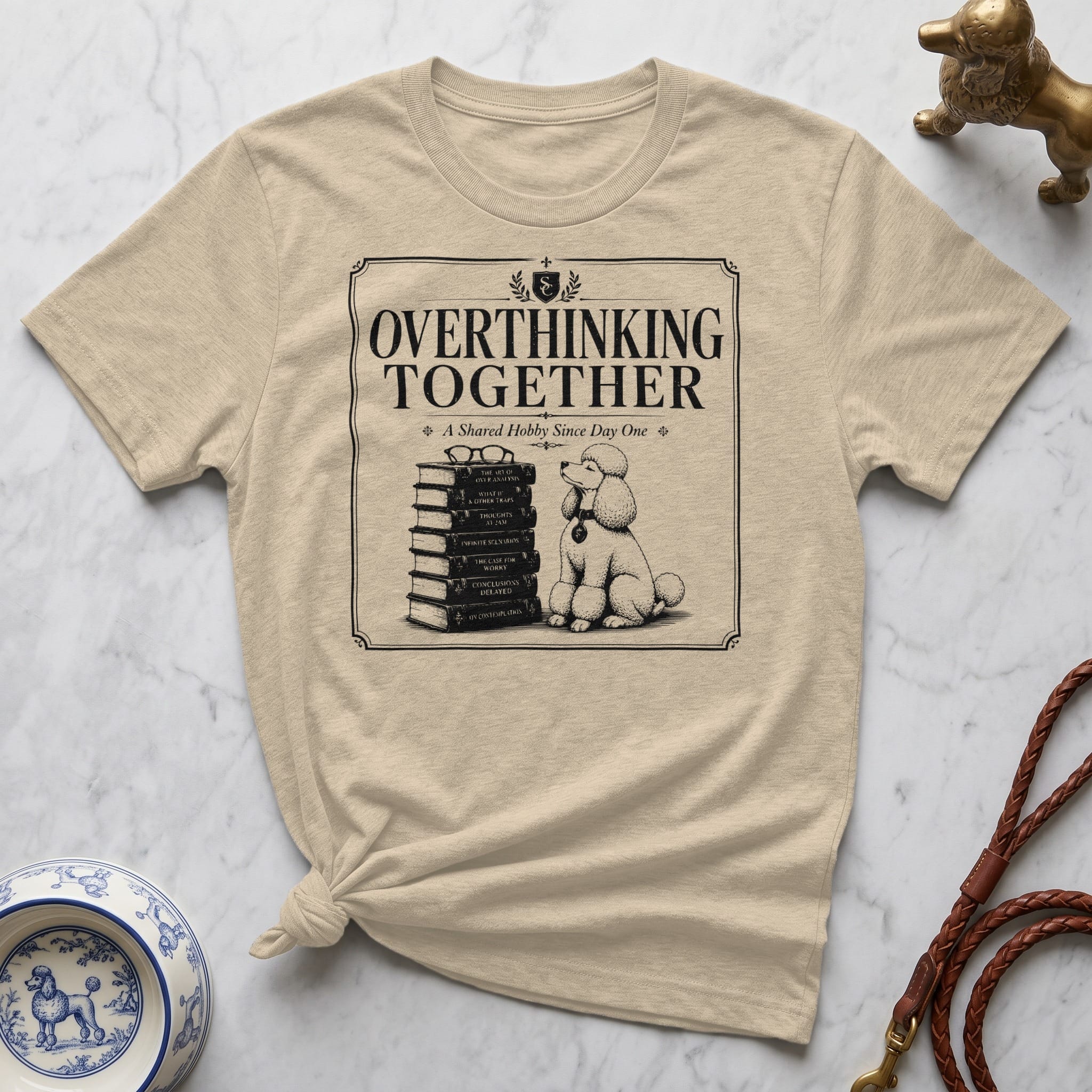 T-shirt with "Overthinking Together" and poodle illustration.