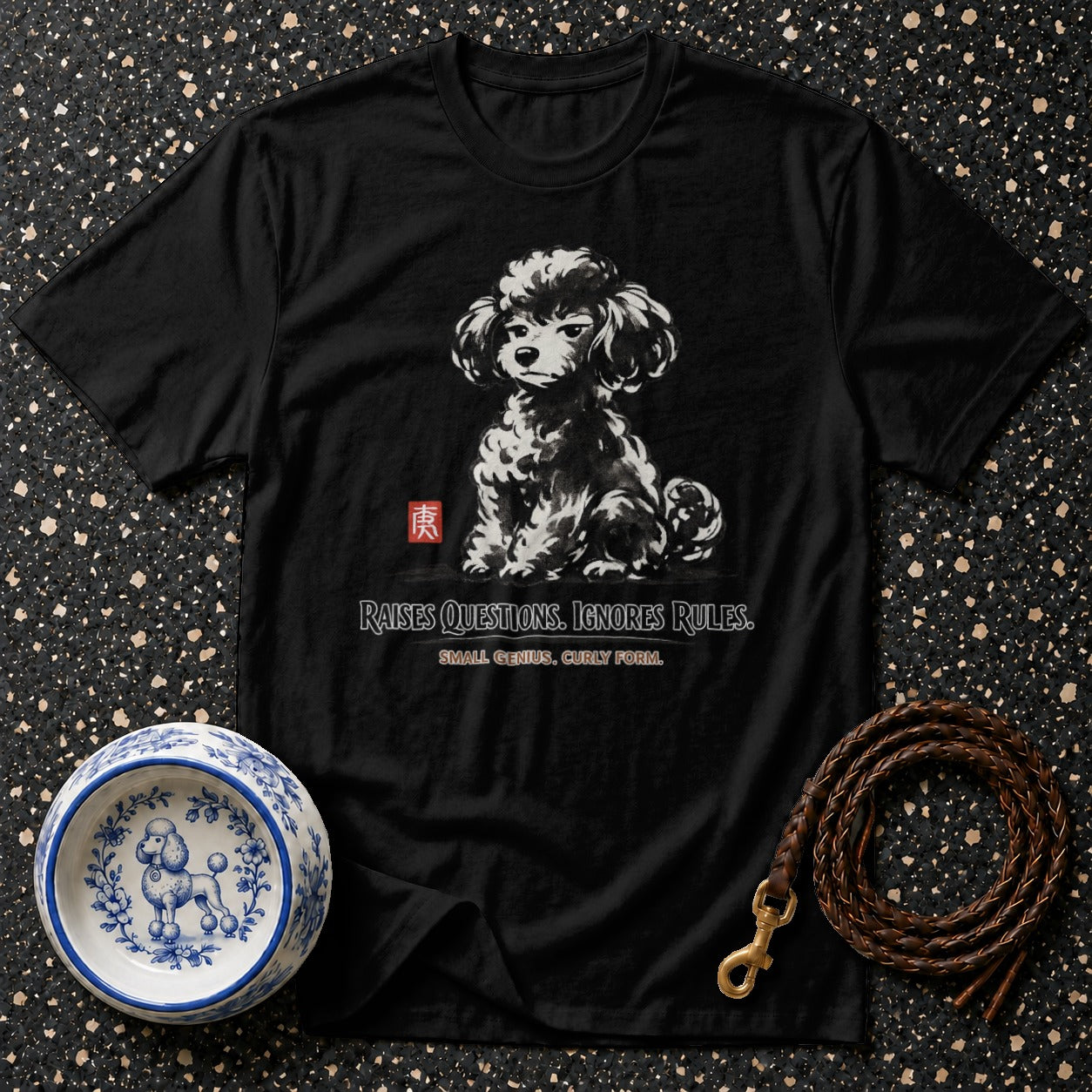 Black t-shirt with a poodle illustration and text "Raises Questions. Ignores Rules."