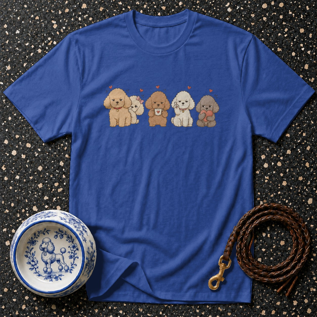 Blue t-shirt with cartoon poodles holding a coffee cup and a heart.