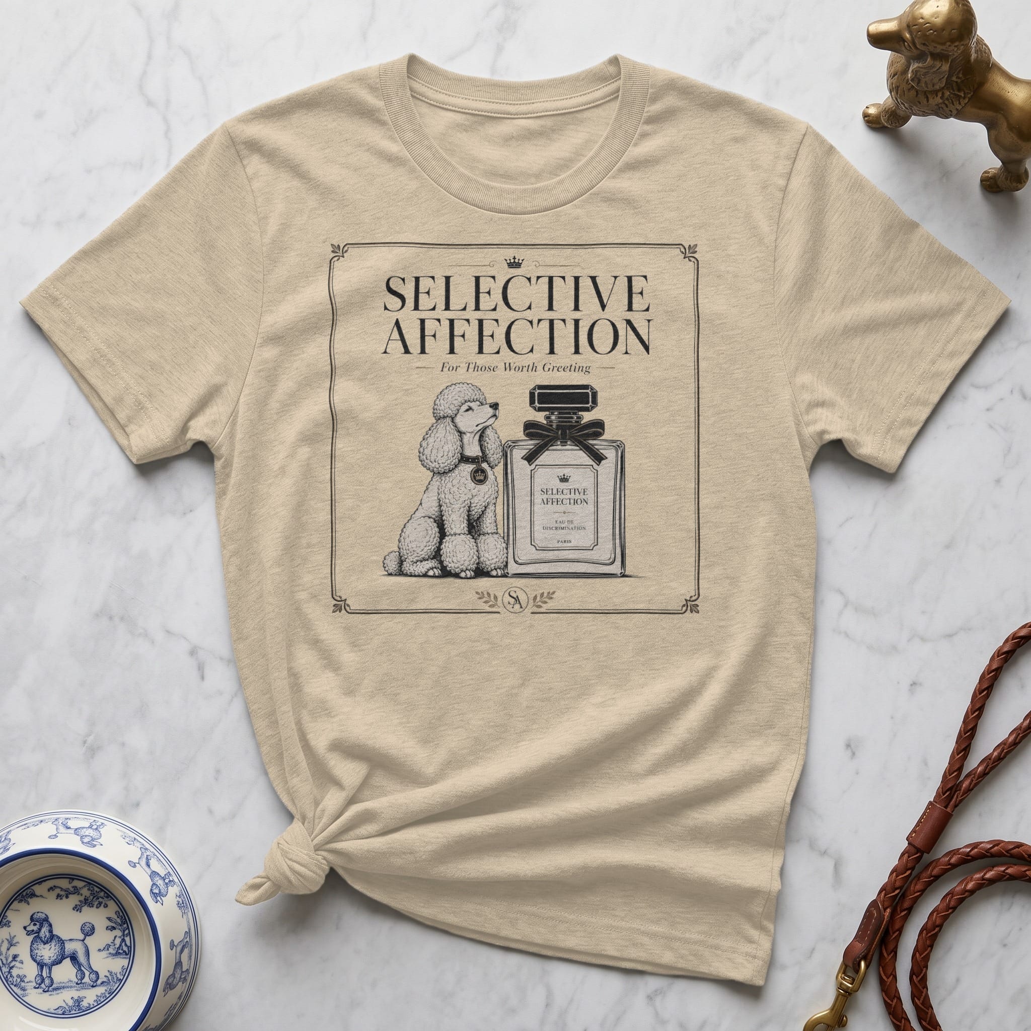 T-shirt with poodle, perfume bottle, and "Selective Affection" text.