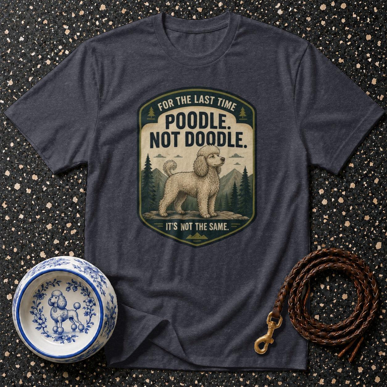 T-shirt graphic with a poodle, text "Poodle. Not Doodle. It's Not The Same."