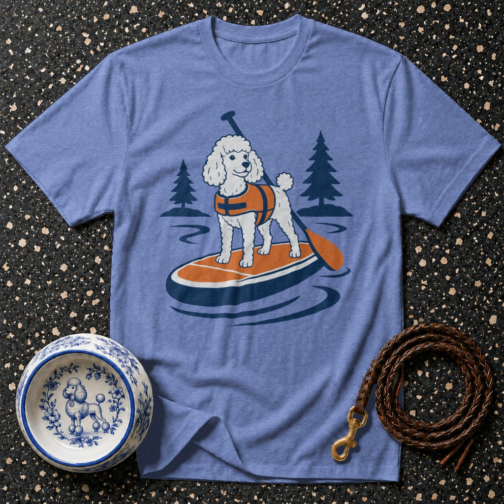 Blue t-shirt with graphic of poodle paddleboarding in orange life vest.