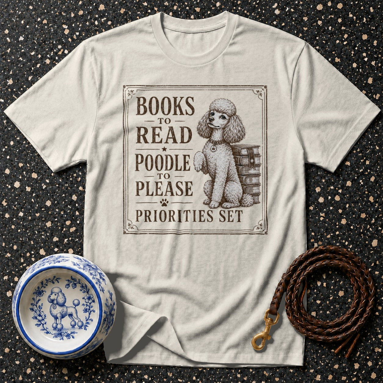 T-shirt with "Books to Read, Poodle to Please, Priorities Set" text and poodle illustration.