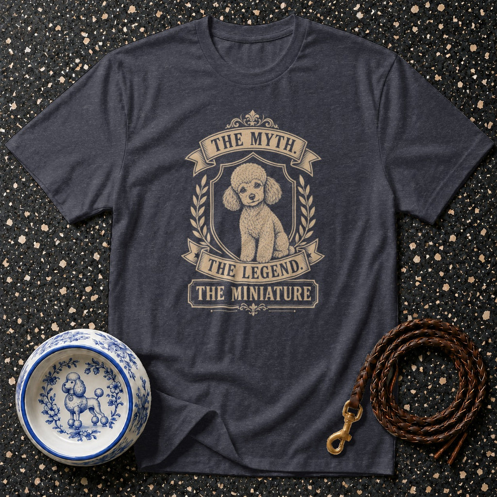 Dark t-shirt with a poodle illustration and text "The Myth, The Legend, The Miniature".