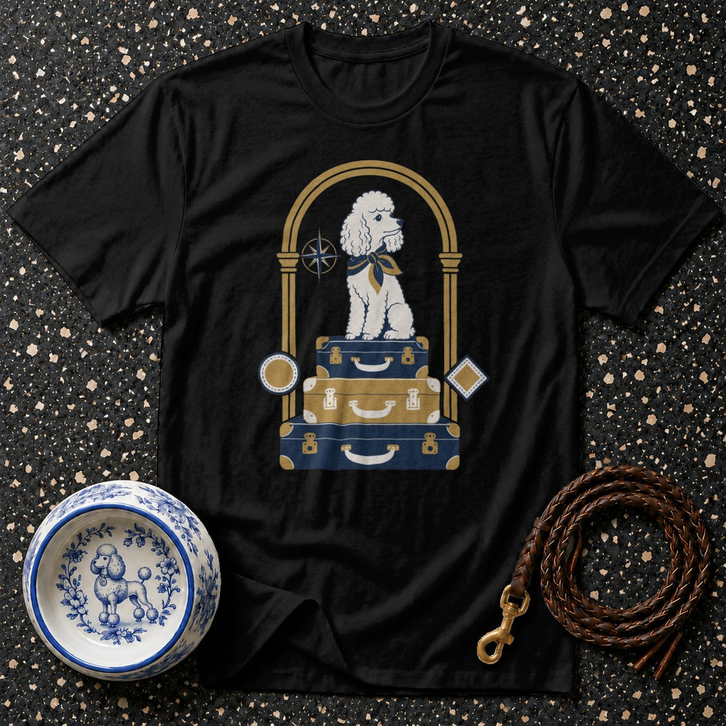 Black t-shirt with a white poodle sitting on stacked luggage.