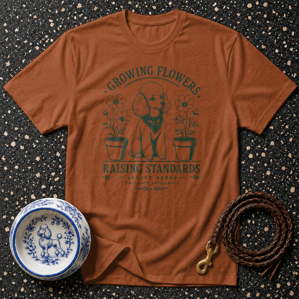 Brown t-shirt with a vintage graphic of a poodle, flowers, and text.