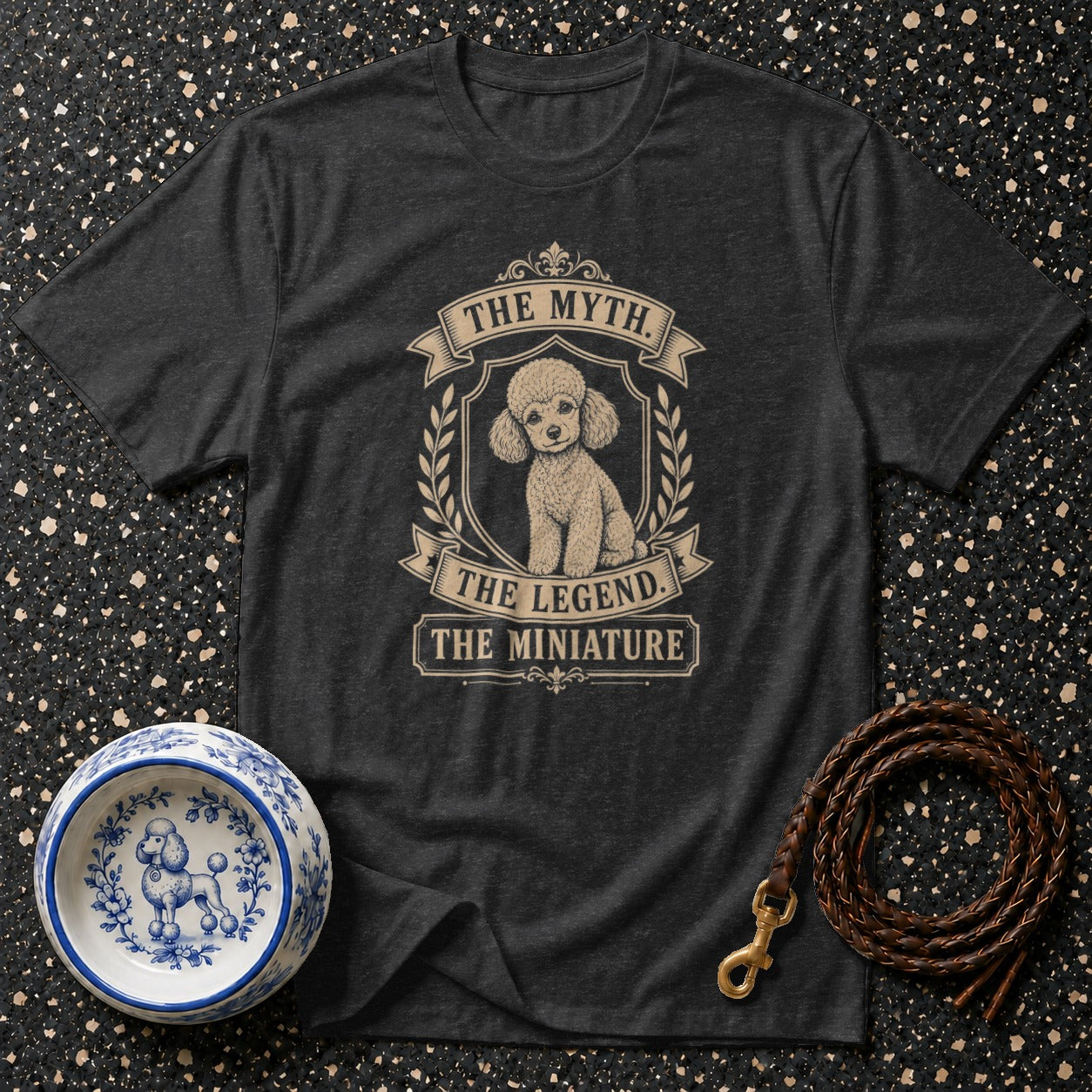Dark grey t-shirt with a poodle graphic and text: The Myth, The Legend, The Miniature.
