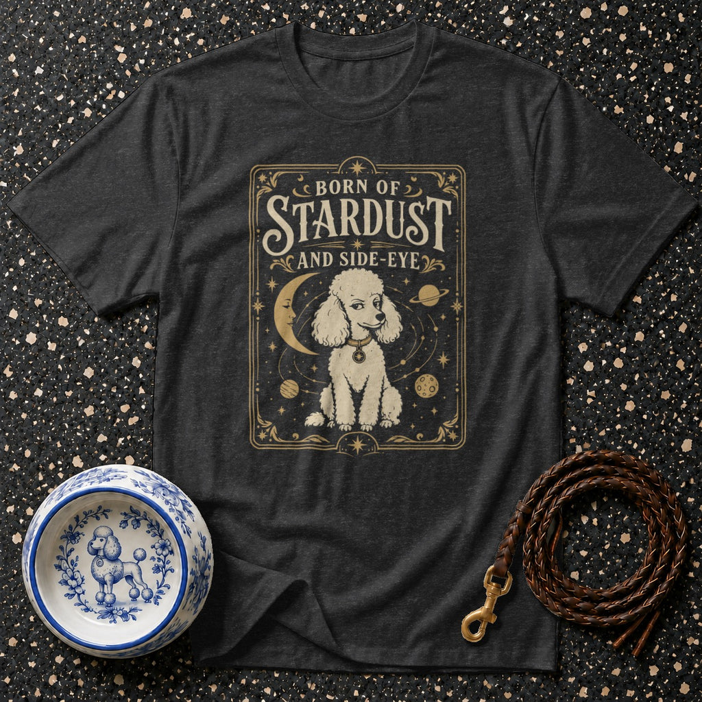 T-shirt with poodle graphic, "Born of Stardust and Side-Eye" text, and celestial theme.