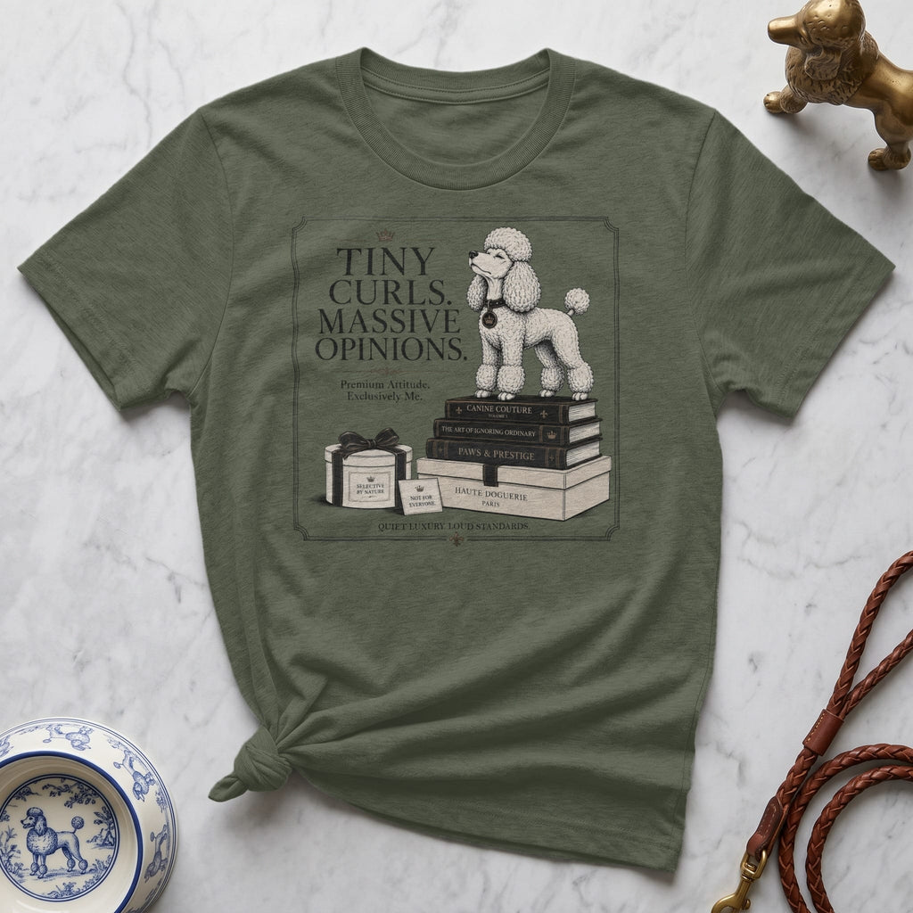 T-shirt with text and poodle illustration on stacked books.