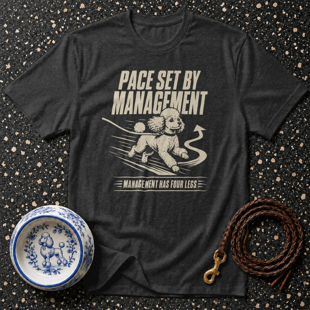 Dark grey t-shirt with a graphic of a running poodle and text "Pace set by management."
