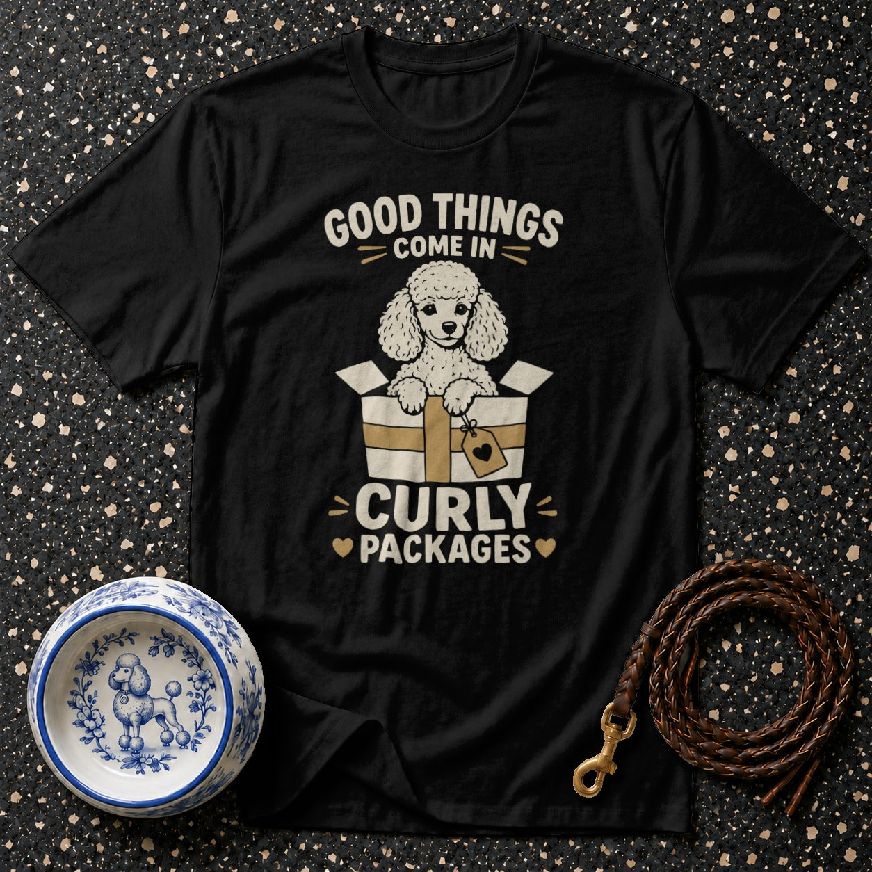 Black t-shirt with poodle in a box graphic and text "Good things come in curly packages".