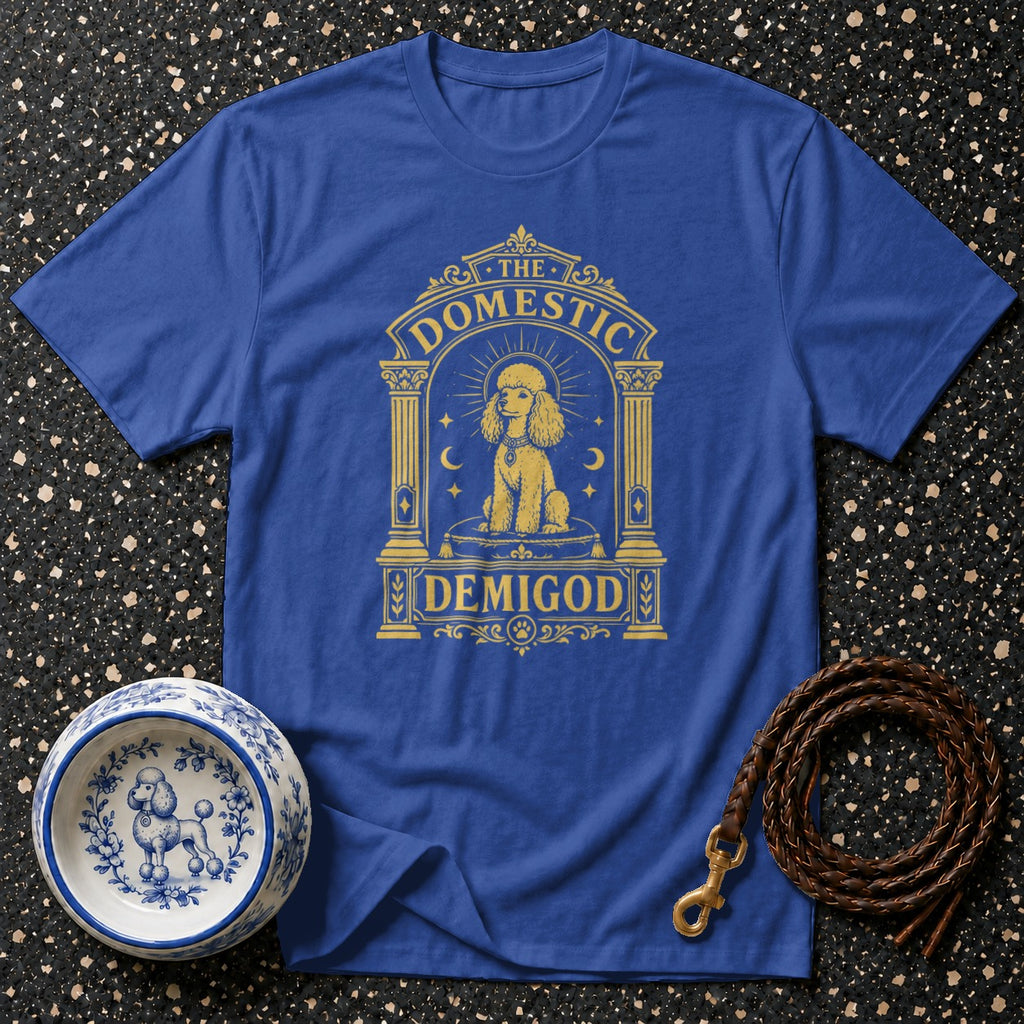 Royal blue t-shirt with gold "The Domestic Demigod" text and poodle graphic.