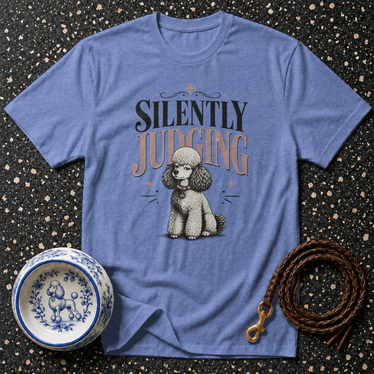 Blue t-shirt with a poodle and the text "Silently Judging".
