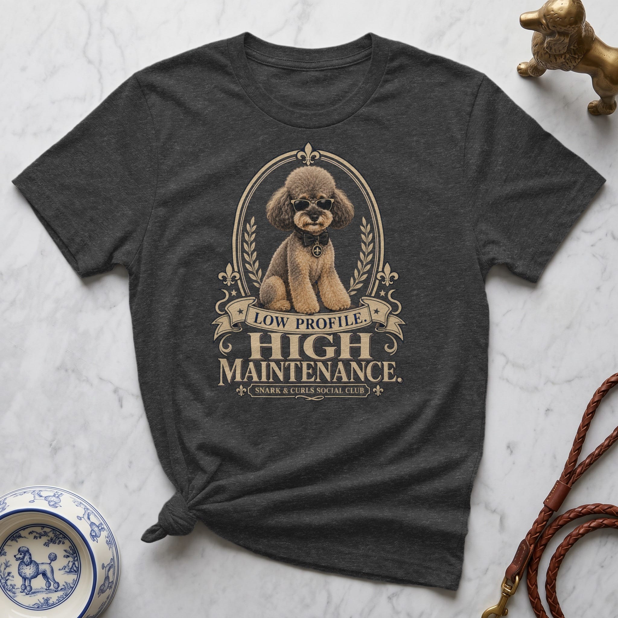 Dark grey t-shirt with illustration of a poodle wearing sunglasses.