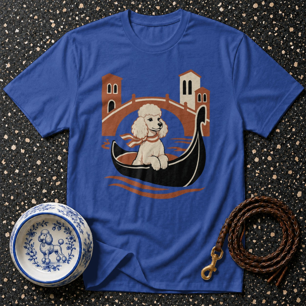 Royal blue t-shirt with a graphic of a poodle in a gondola in front of a Venetian bridge.