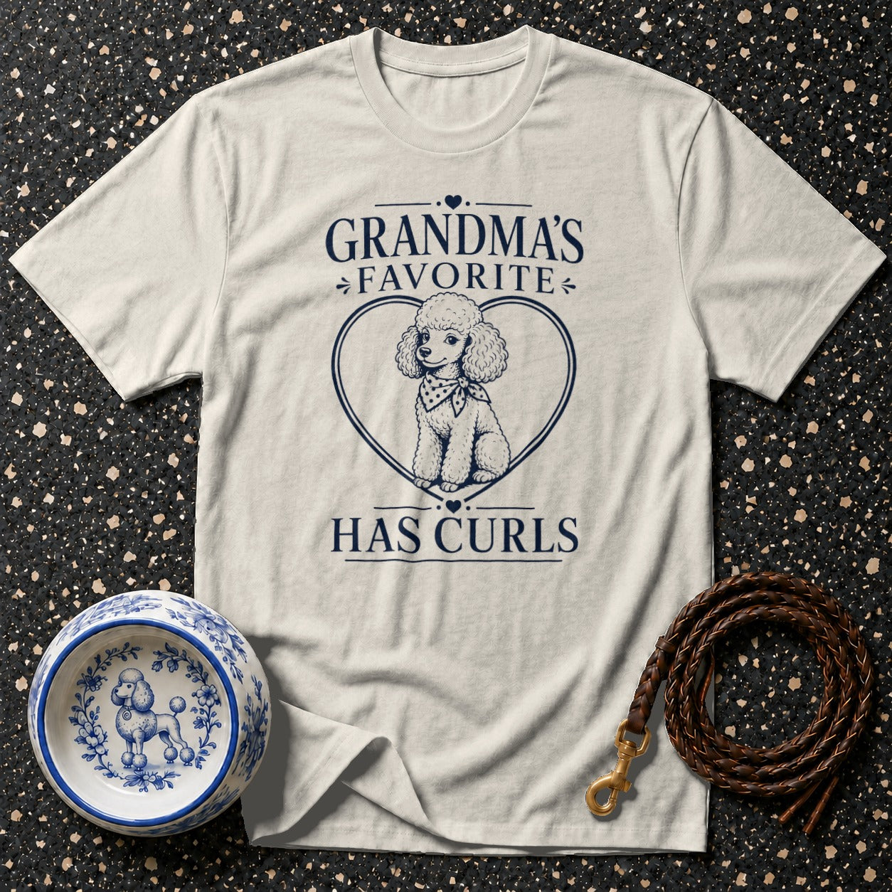 Light grey t-shirt with a poodle graphic and text "Grandma's Favorite Has Curls".