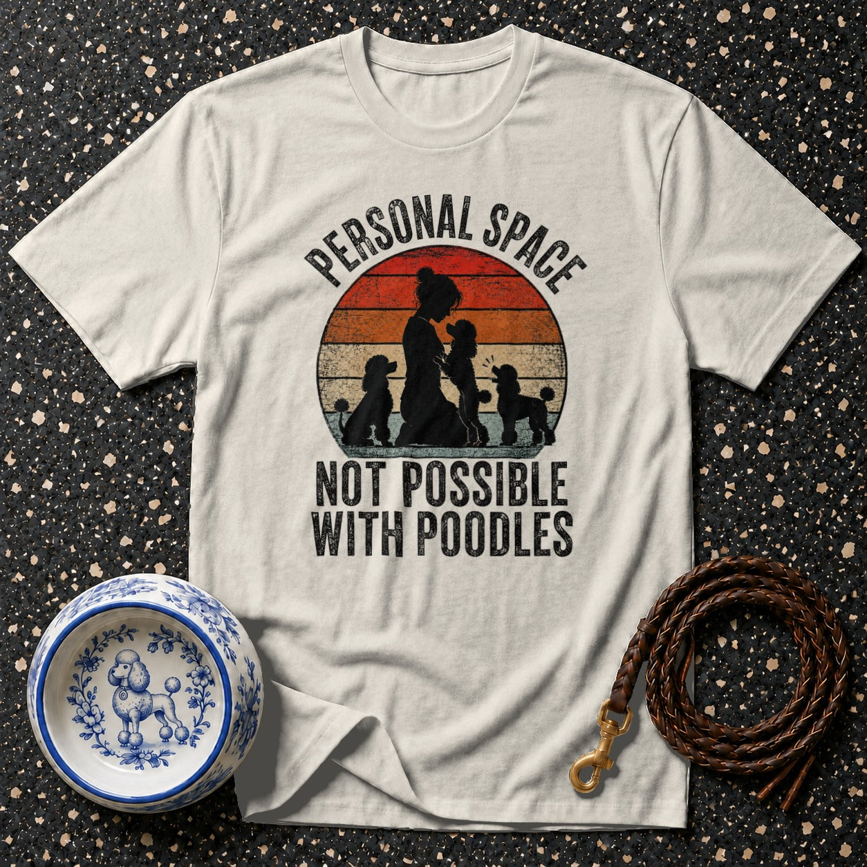 T-shirt with silhouette of woman with poodles and text "Personal Space Not Possible With Poodles".