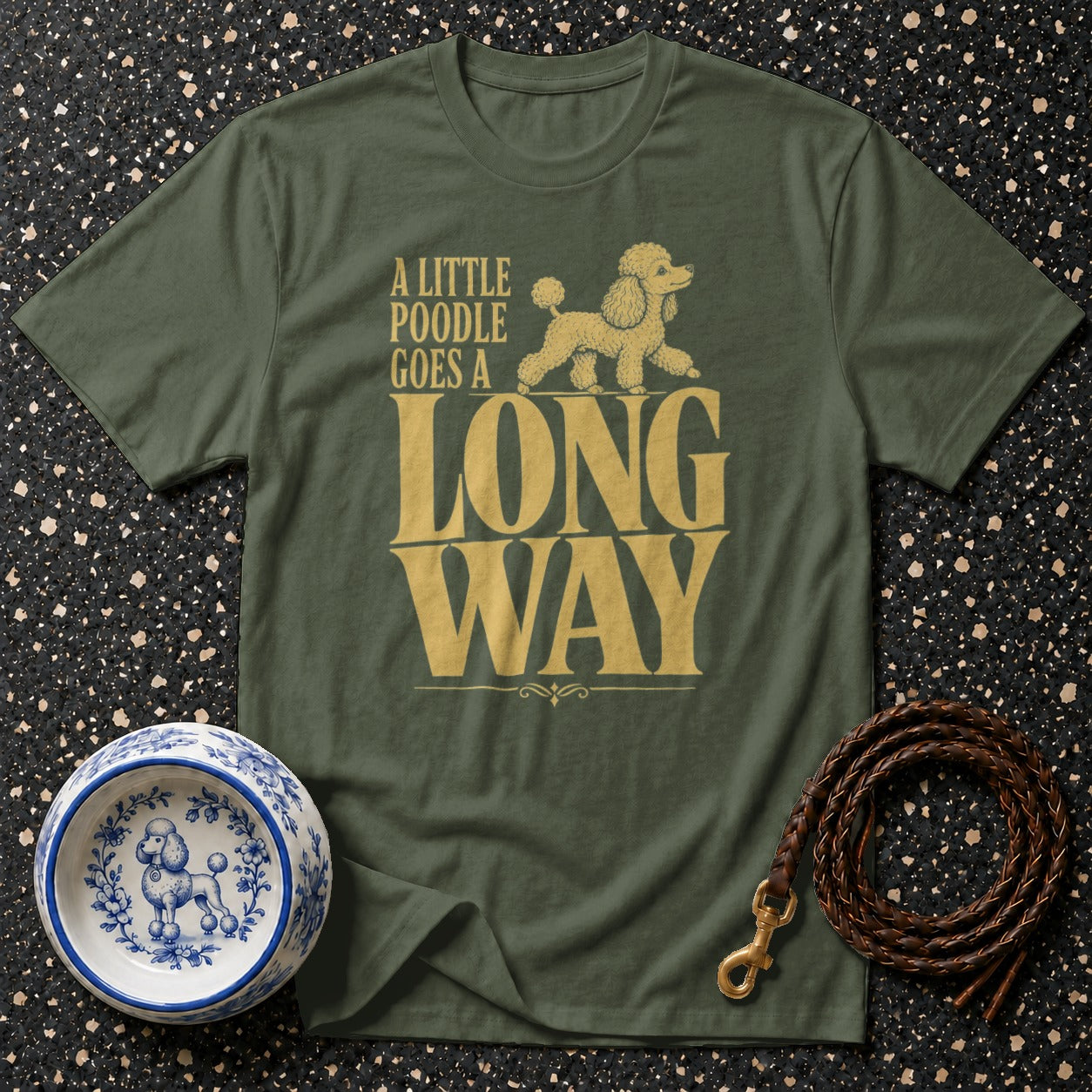 Olive t-shirt with poodle graphic and text "A little poodle goes a long way".