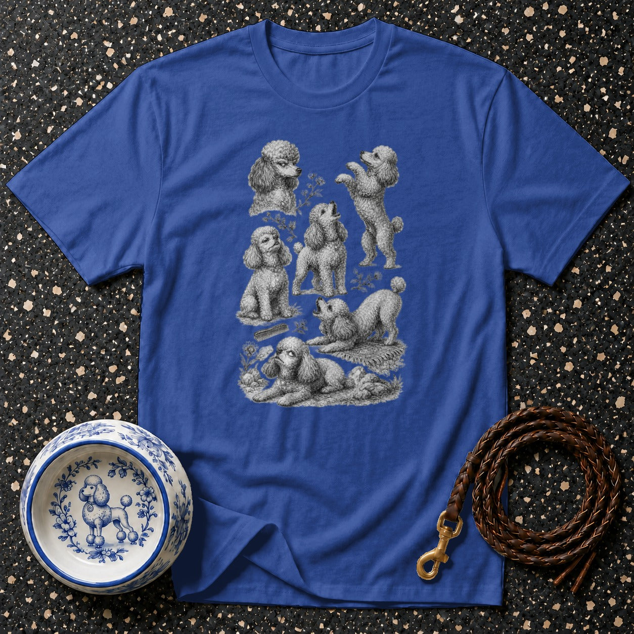 Blue t-shirt with vintage poodle illustrations and a dog bowl.