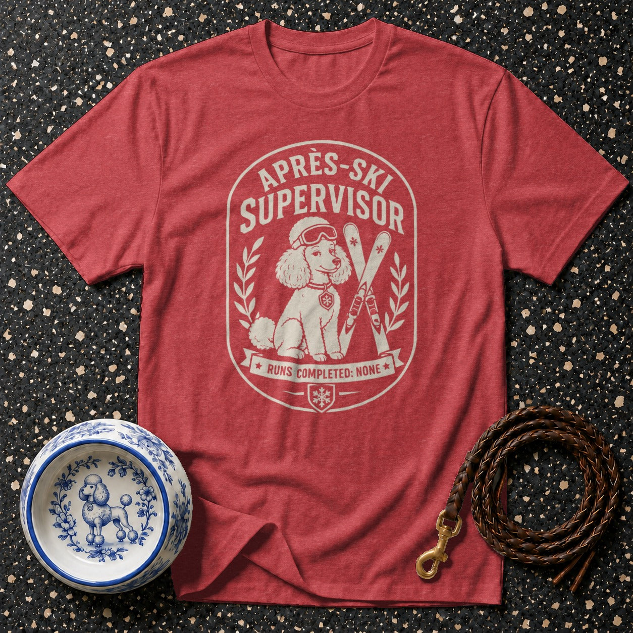 Red t-shirt with "Après-Ski Supervisor" text and poodle graphic.
