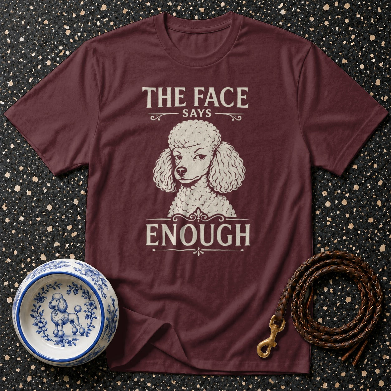 Maroon t-shirt with white poodle graphic and text "THE FACE SAYS ENOUGH".