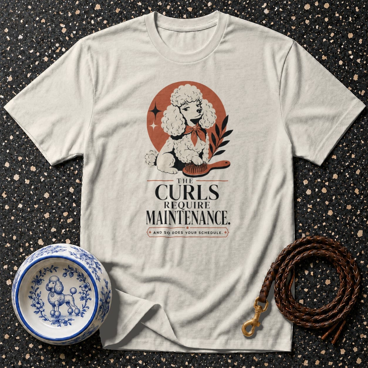 Cream t-shirt with poodle graphic and text "The Curls Require Maintenance."