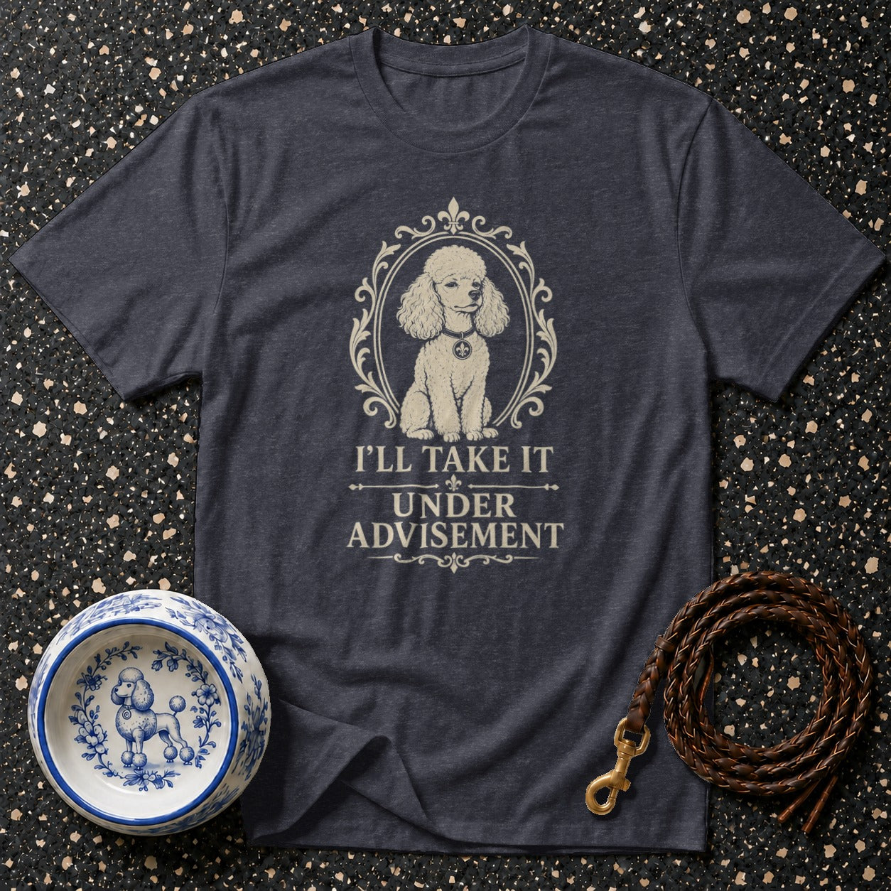 Dark t-shirt with framed poodle graphic and text "I'LL TAKE IT UNDER ADVISEMENT".
