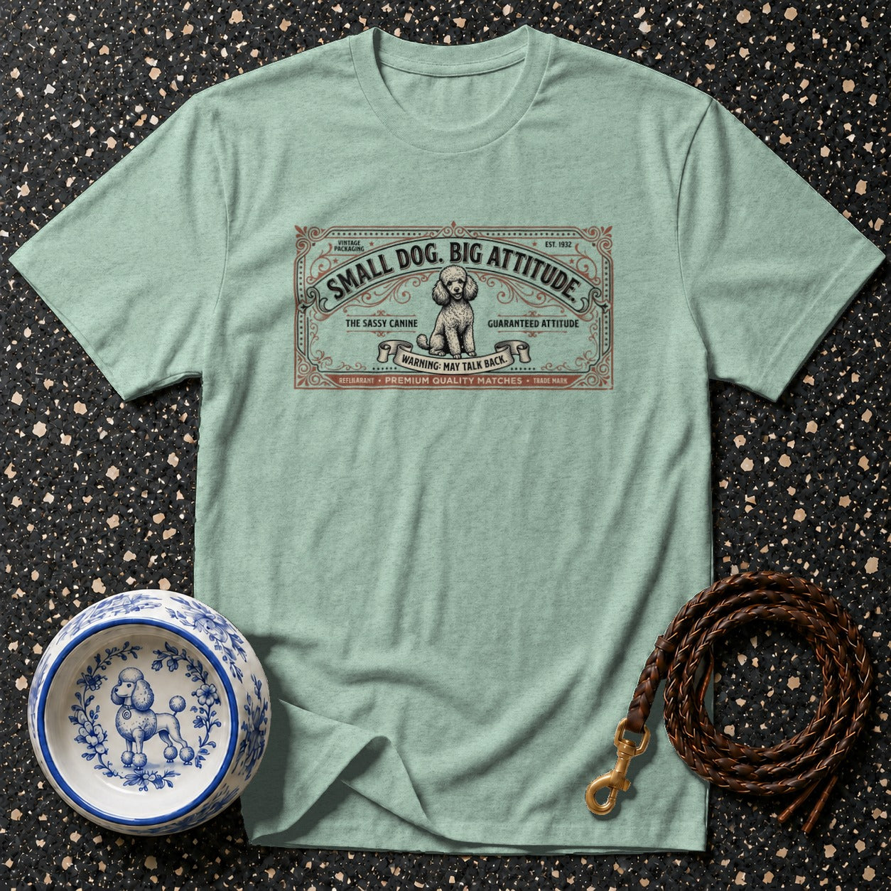 Light green t-shirt with "Small Dog. Big Attitude." design and poodle illustration.
