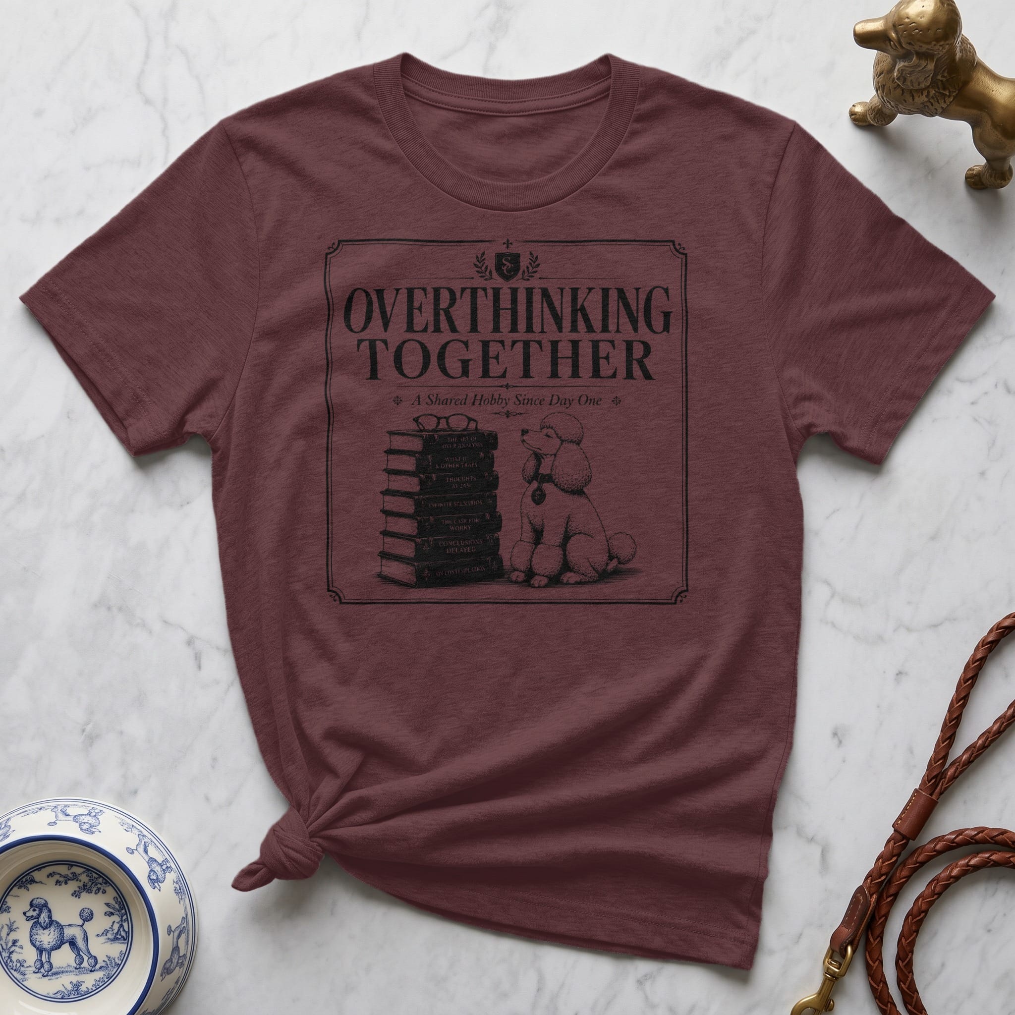 Maroon t-shirt with "Overthinking Together" and poodle illustration.