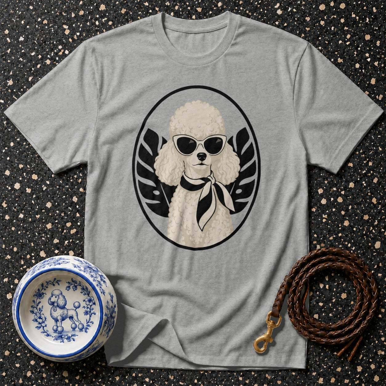Grey t-shirt with a stylized poodle wearing sunglasses and a scarf.