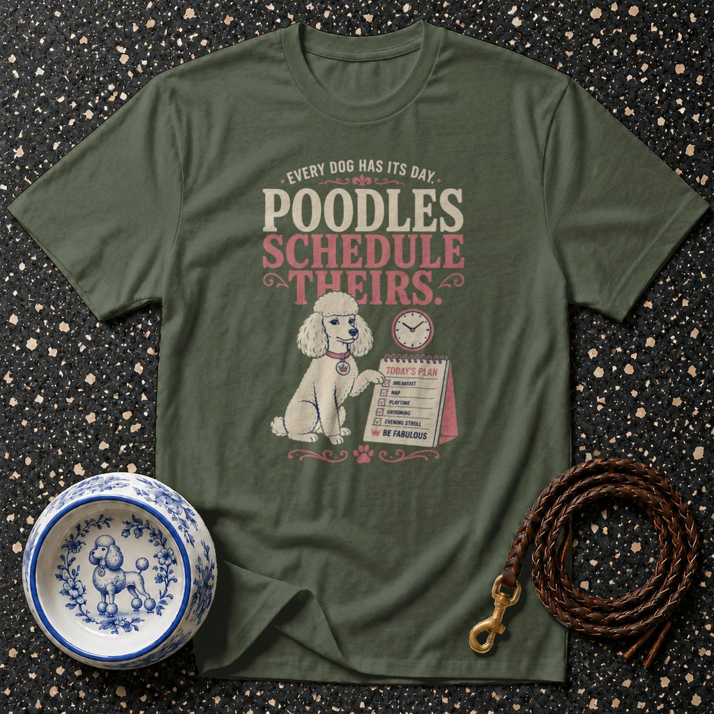 Green t-shirt with poodle schedule graphic and poodle accessories.