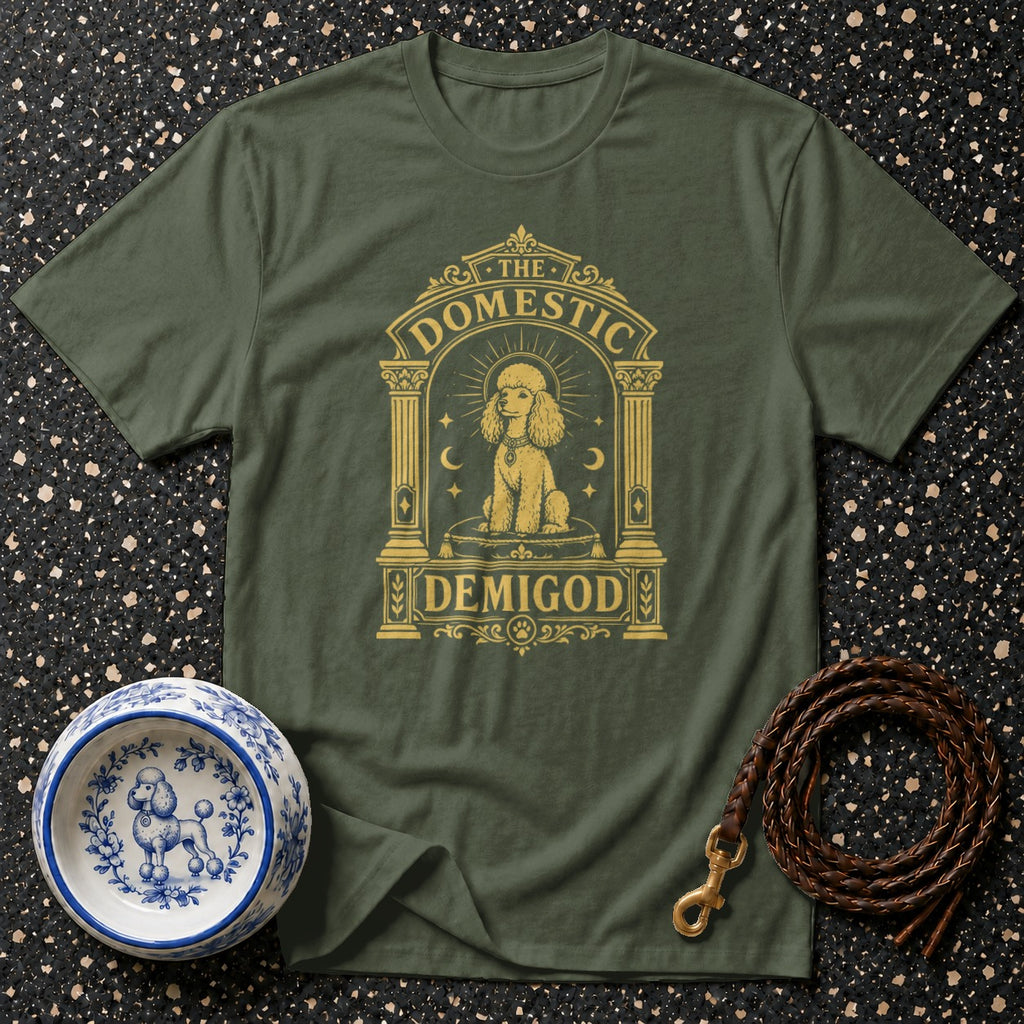 Green t-shirt with "The Domestic Demigod" text and poodle graphic.